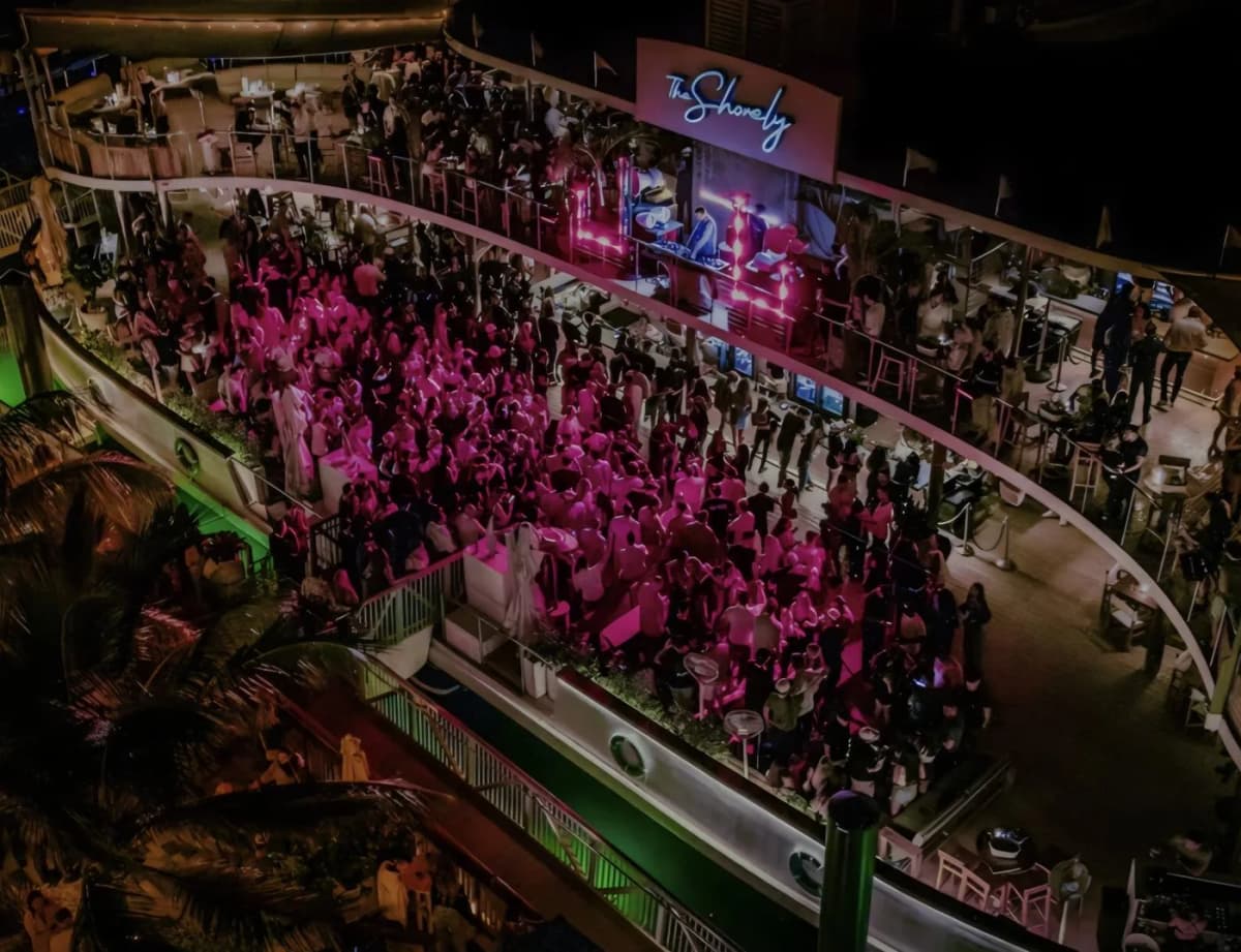 A crowd on The Shorely’s Lower Deck at night